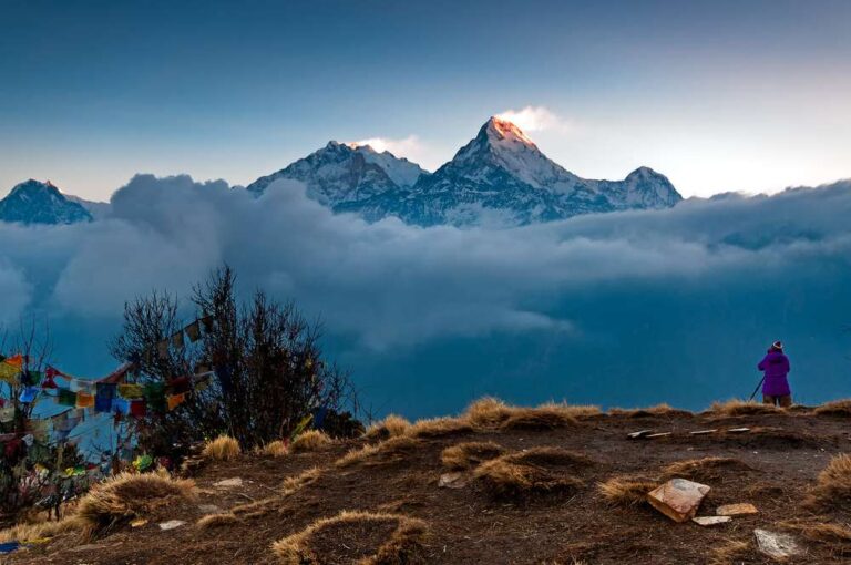 person-taking-photo-annapurna-mountain-from-poonhill